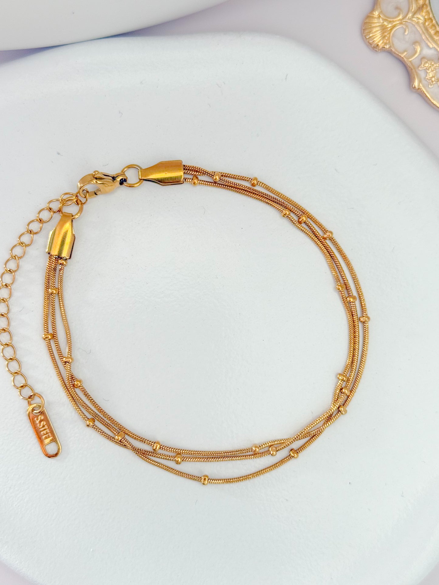 PULSERA TRES CAPAS
