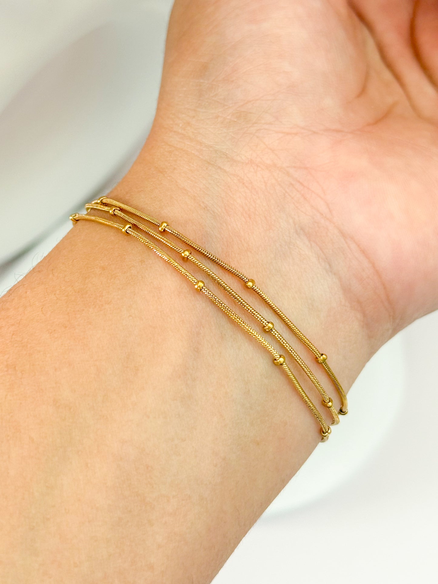 PULSERA TRES CAPAS